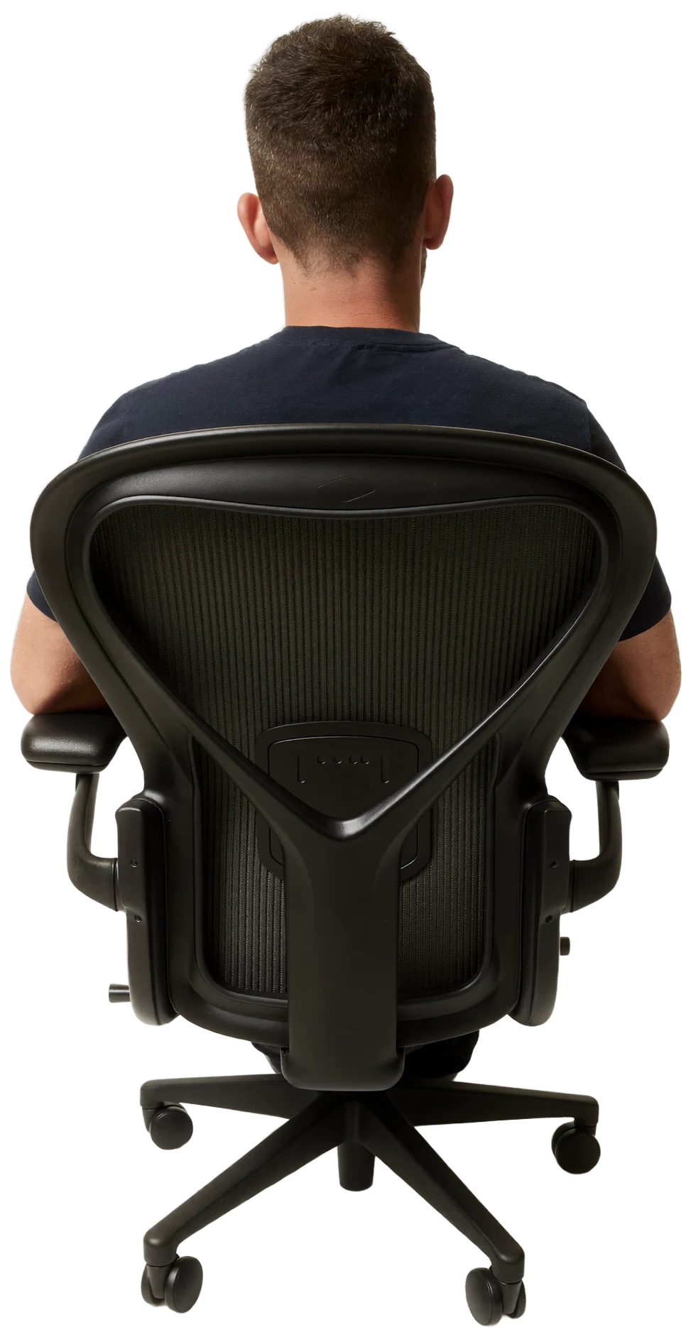 Founder seated at the center of the work, holding everything together